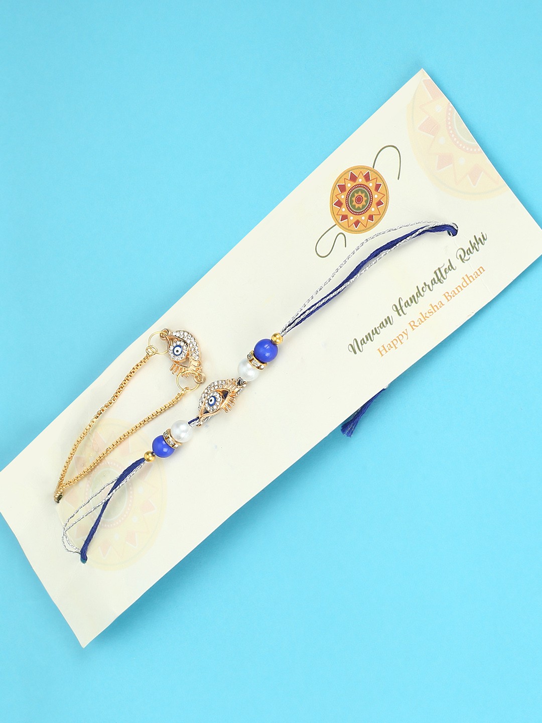 

Nanwan Set of 2 Assorted Evil Eye Charm Studded Bhaiya Bhabhi Rakhi Gift Set