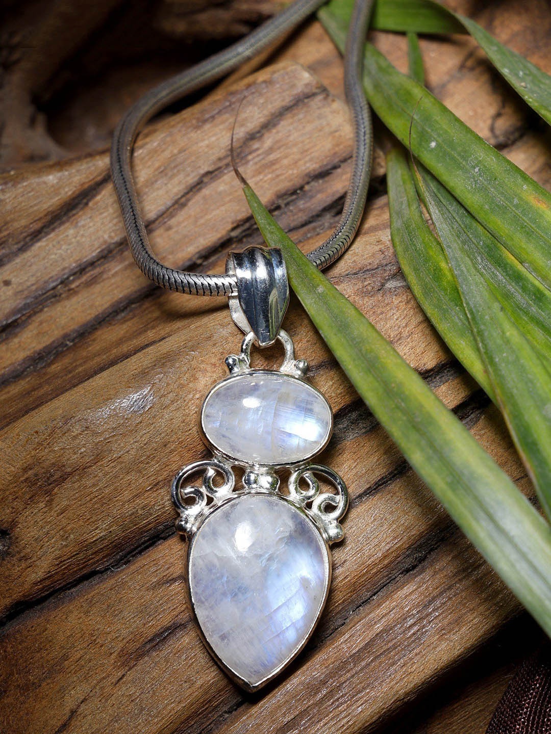 

Exotic India Rainbow Moonstone Sterling Silver Pendant