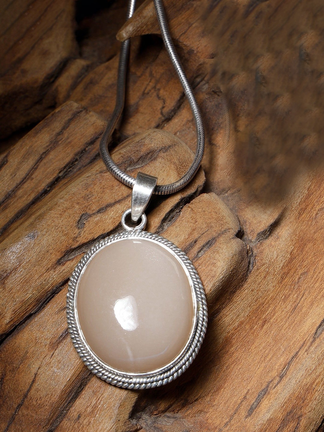 

Exotic India Oval Shaped Opal Sterling Silver Pendant