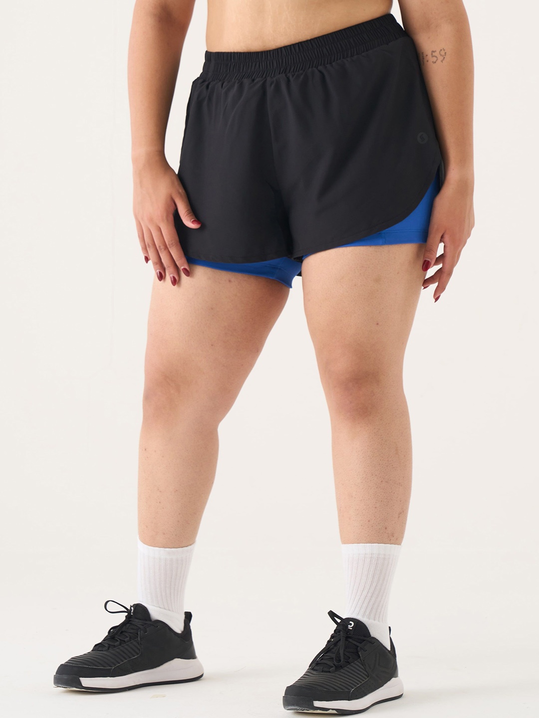 

SPIRIT ANIMAL Women Solid Regular Fit Mid-Rise Sports Shorts, Blue