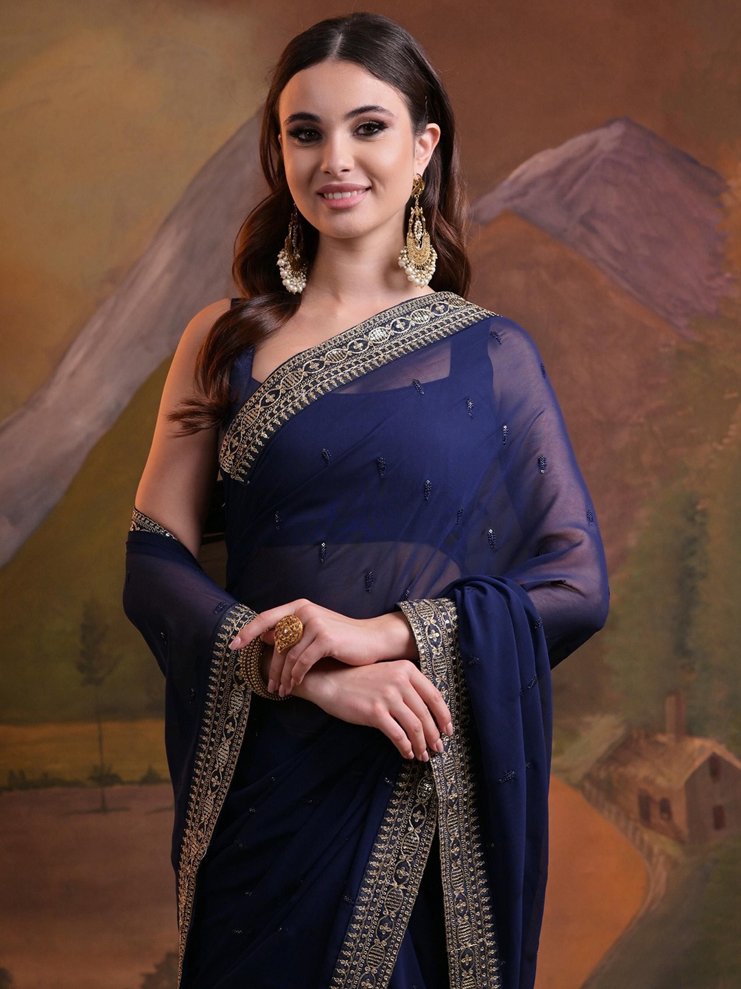 

Mitera Embroidered Embellished Sequinned Pure Georgette Saree, Navy blue