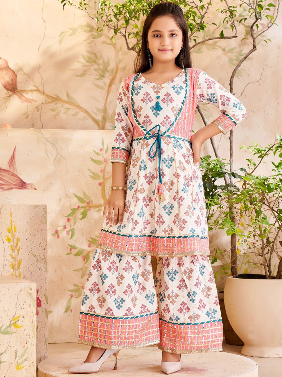 

Aarika Girls Ethnic Motifs Printed Regular Gotta Patti Pure Cotton Kurta With Sharara, Peach