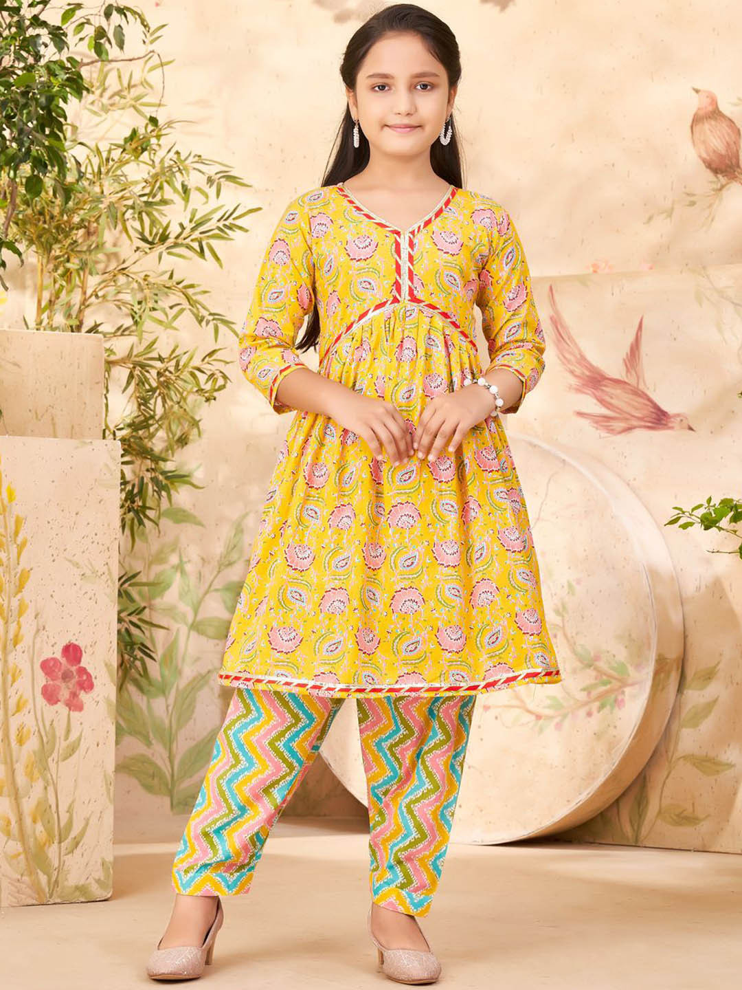 

Aarika Girls Floral Printed Regular Pure Cotton A-Line Kurta With Patiala, Yellow