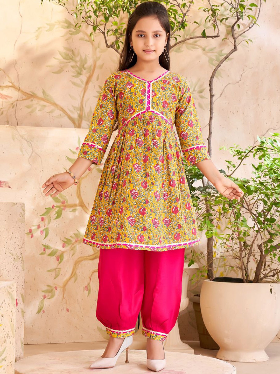 

Aarika Girls Floral Printed Regular Gotta Patti Pure Cotton A-Line Kurta With Patiala, Yellow