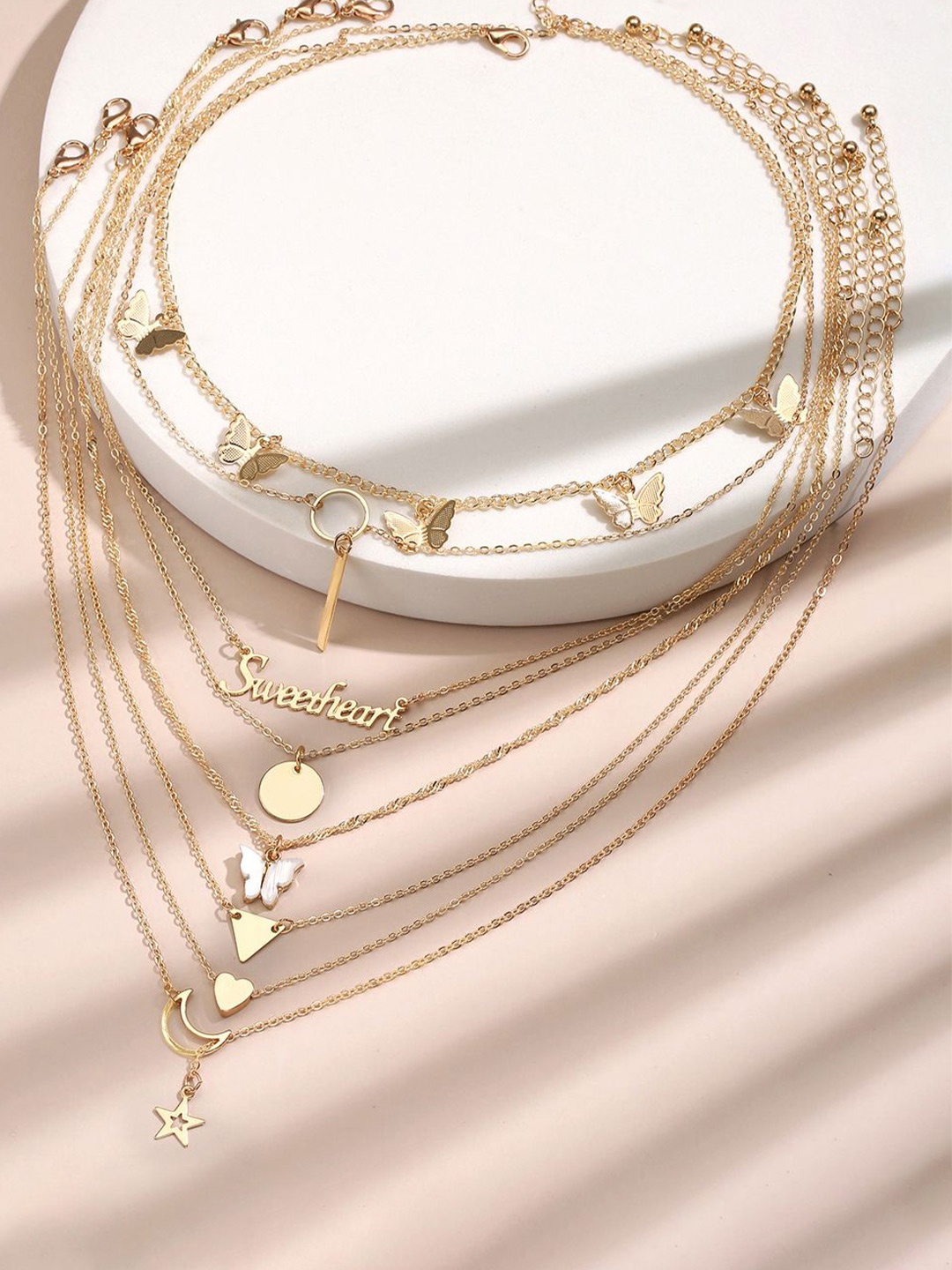 

Jewels Galaxy Set Of 8 Gold-Plated Stone Studded Brass Layered Necklace
