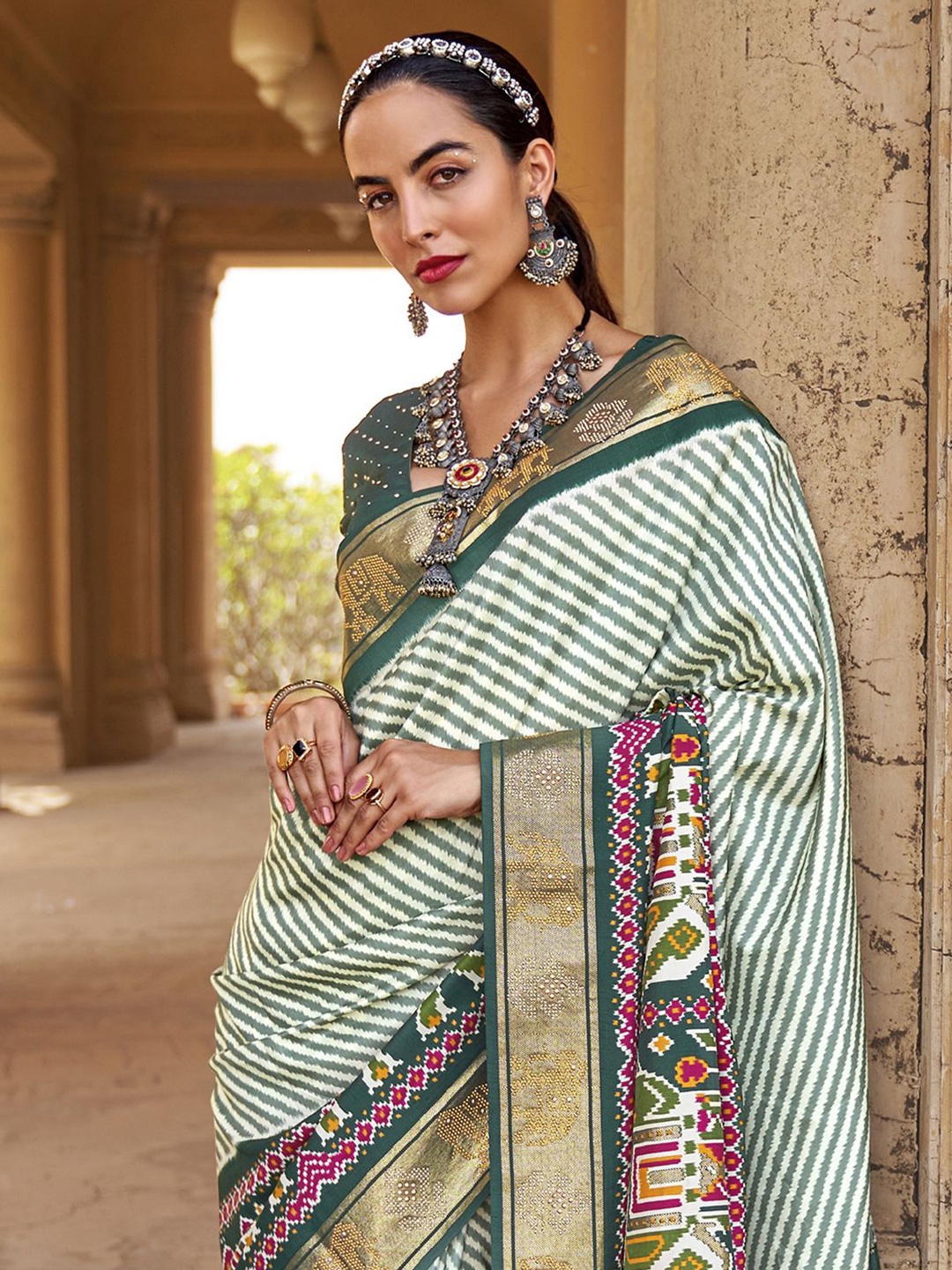 

Anouk Leheriya Zari Patola Saree, Green