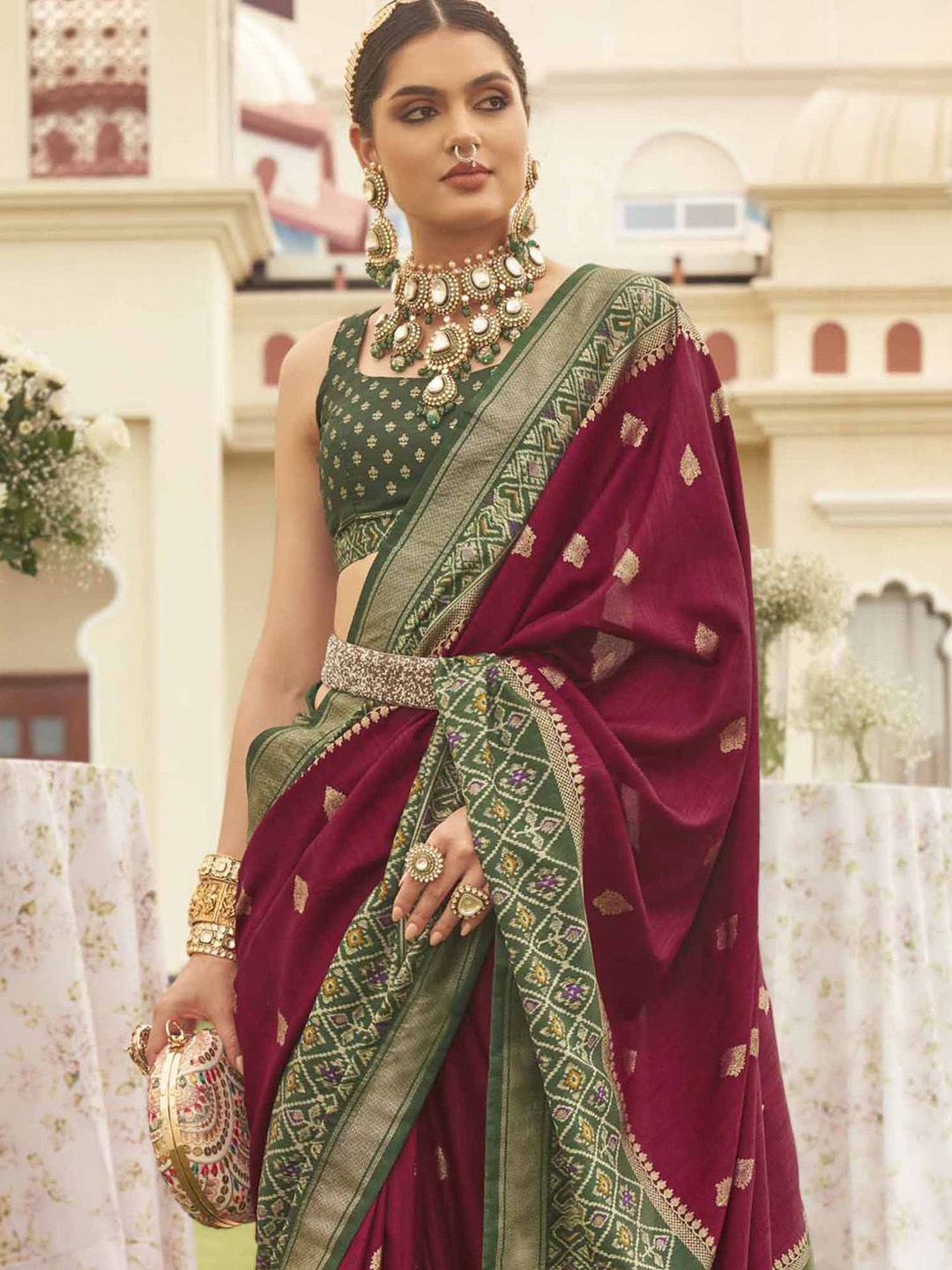 

Anouk Woven Design Zari Patola Saree, Magenta