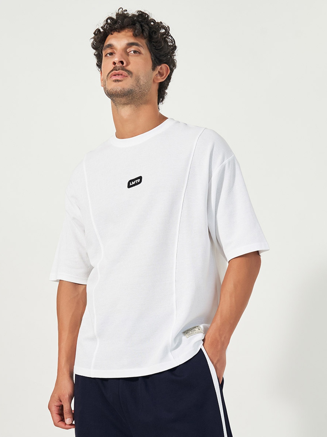 Styli Men Cotton Waffle Knit Oversized T-shirt and Wide Leg Side Tape Jogger Co-ord, White