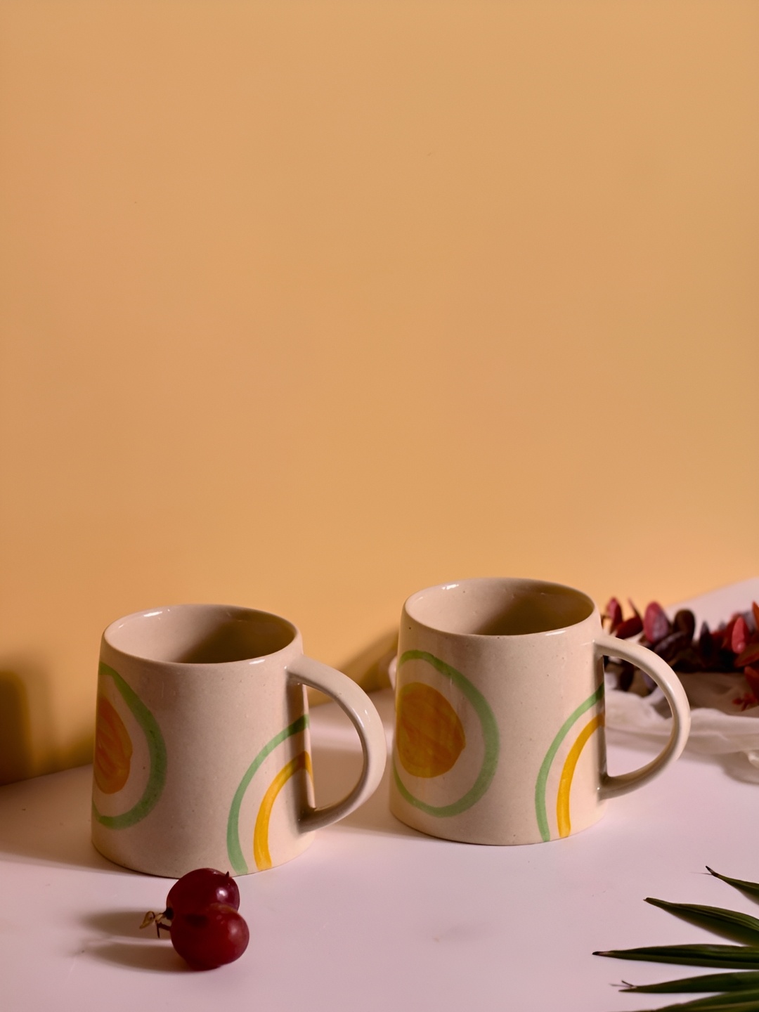 

WEAVING HOMES Yellow & Green 2 Pieces Printed Ceramic Glossy Mugs 250 ml