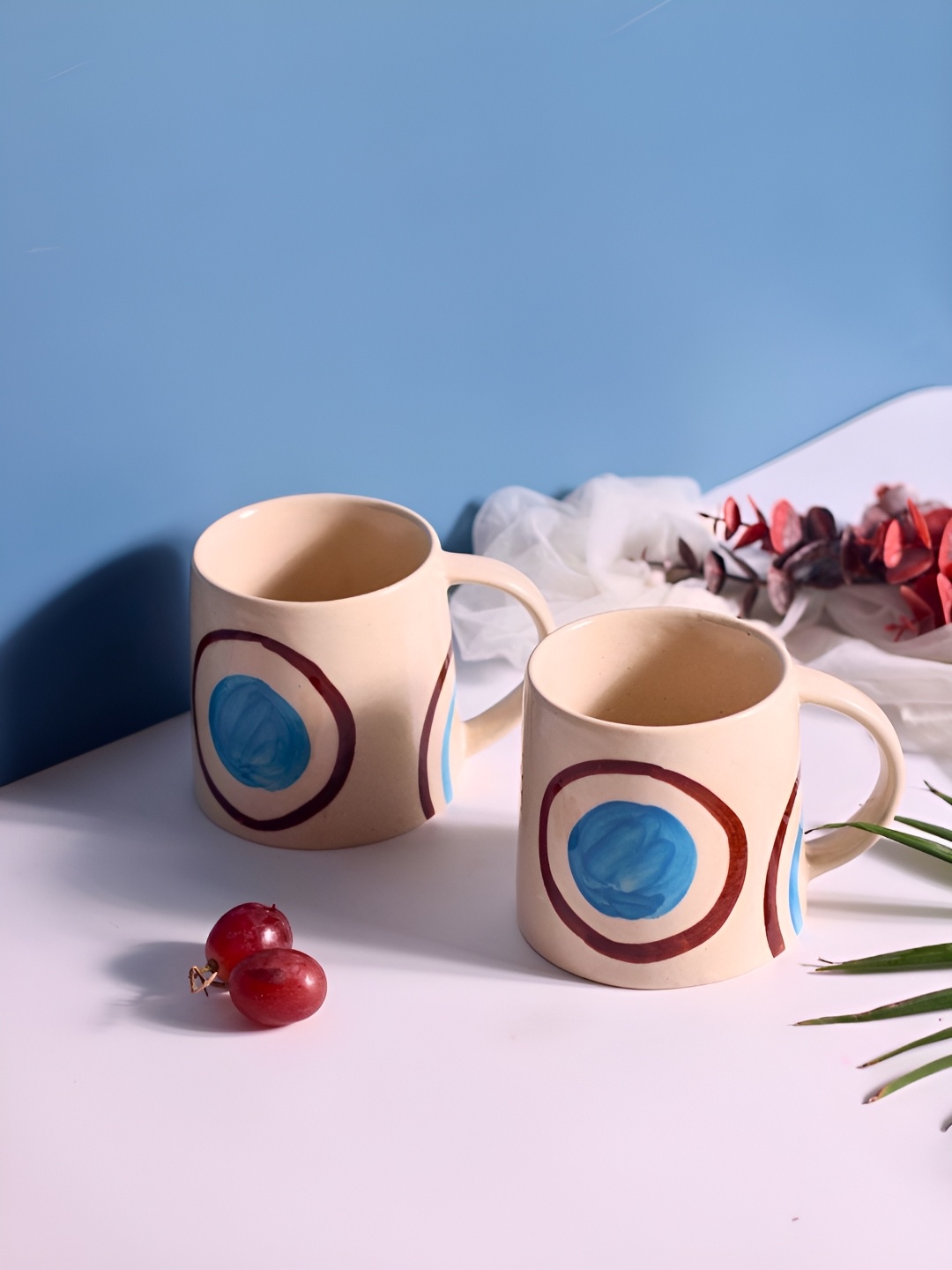 

WEAVING HOMES Beige & Blue 2 Pieces Printed Ceramic Glossy Finished Mugs 200 ml Each