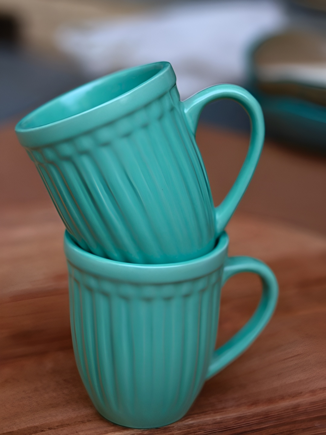 

WEAVING HOMES Teal Blue 2 Pieces Textured Ceramic Matte Finished Mugs 250 ml Each