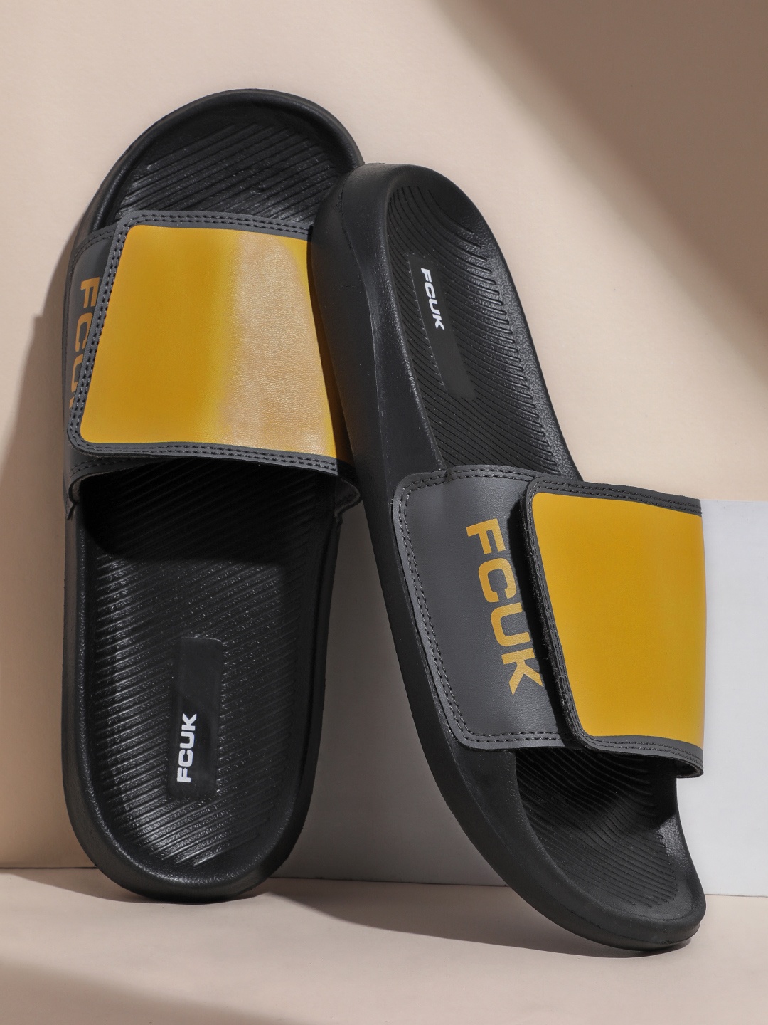 

FCUK Men Brand Logo Printed Sliders, Black