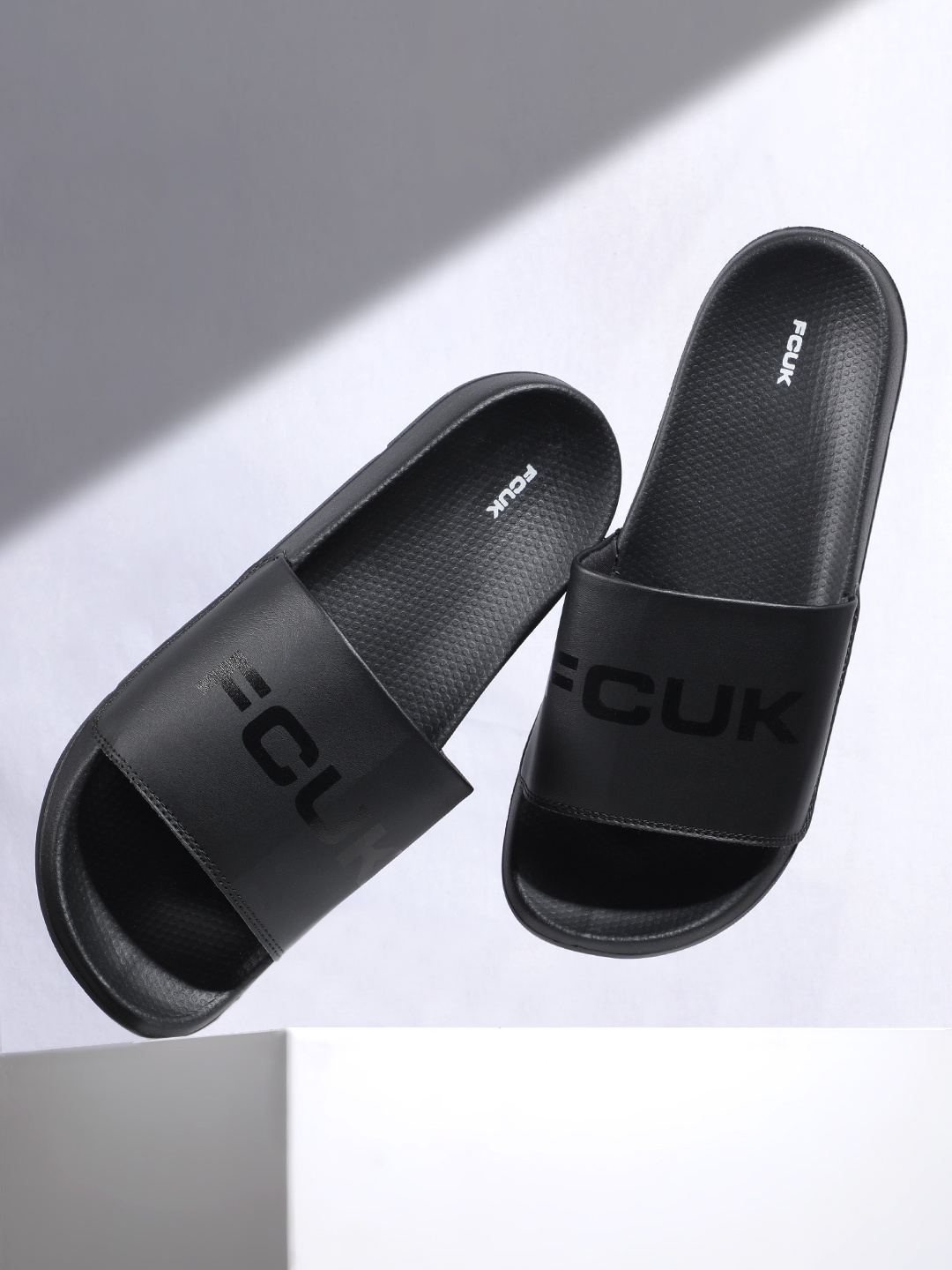 

FCUK Men Brand Logo Printed Sliders, Black