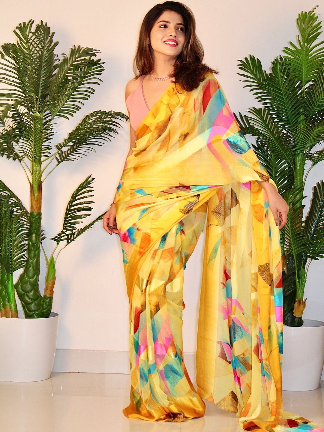 

SANJANA SILK Abstract Printed Pure Georgette Saree, Yellow