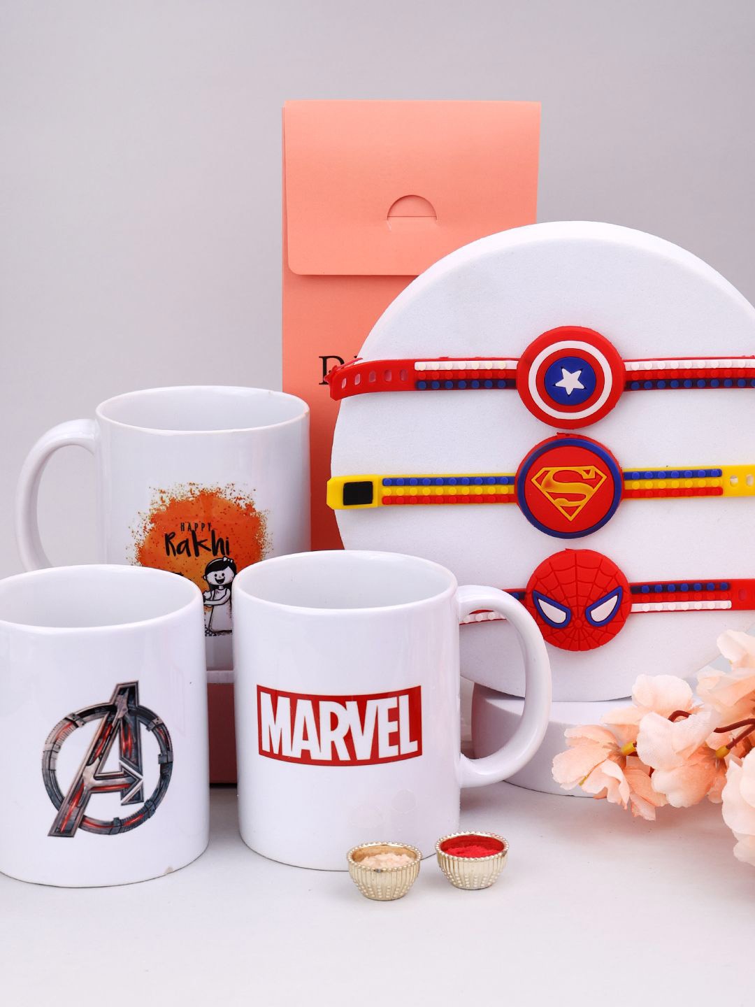 

PANASH Kids Set Of 6 Circle Shaped Rakhis With Printed Mugs & Roli Chawal, Red