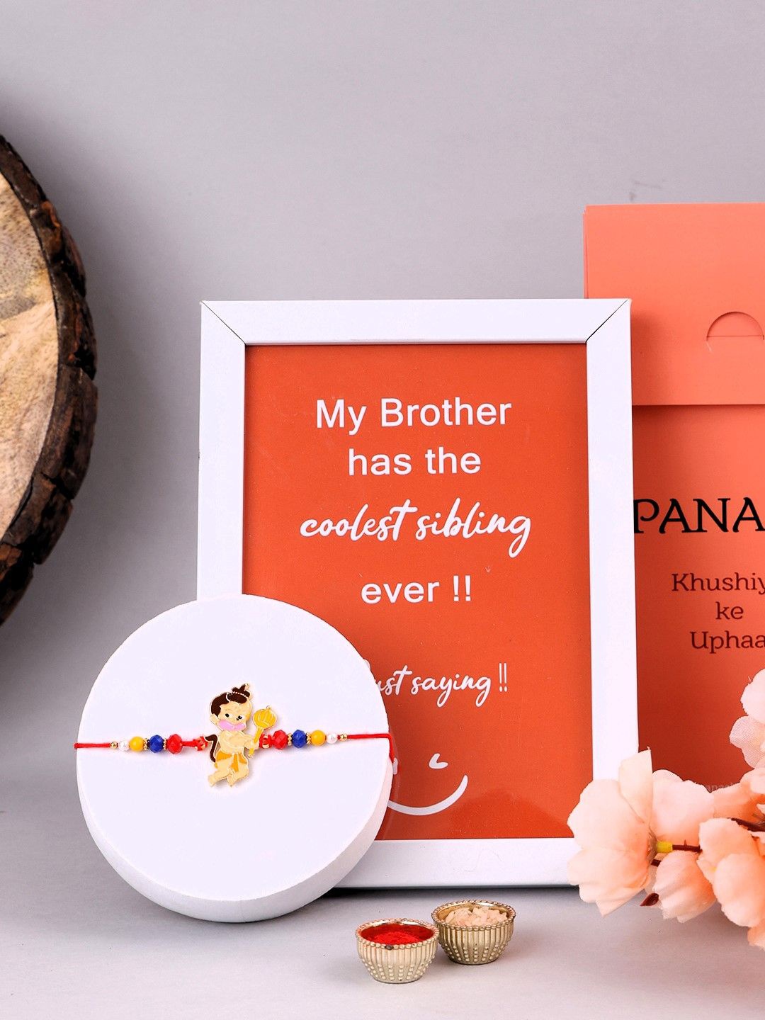 

PANASH Kids Set Of 2 Gold-Plated Hanuman Shaped Rakhi With Photo Frame & Roli Chawal