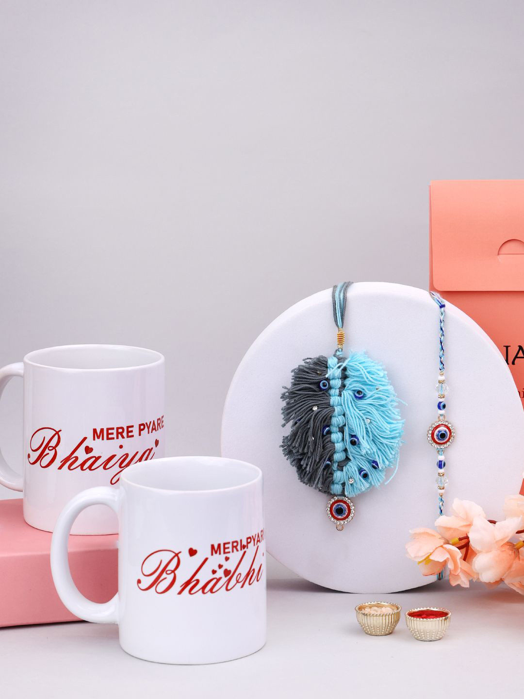 

PANASH Set Of 4 Gold Plated Beaded With Stone Studded Rakhis With Mugs & Roli Chawal