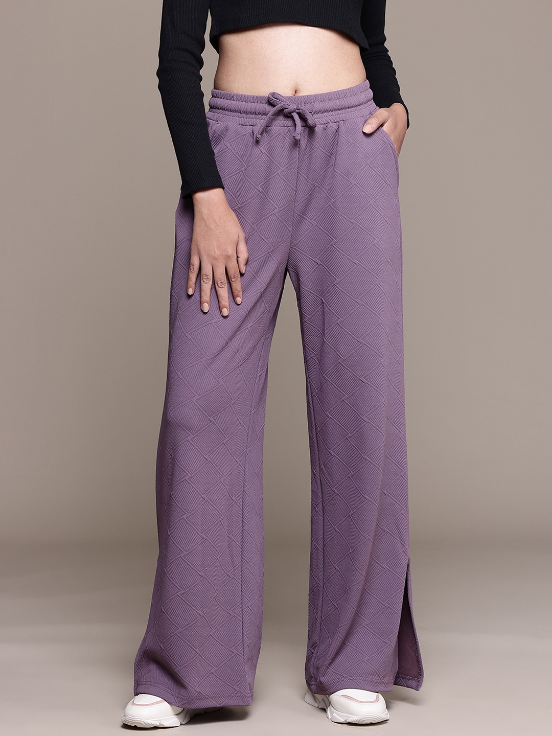 

The Roadster Lifestyle Co. Women Textured Flared Track Pants With Slit, Purple