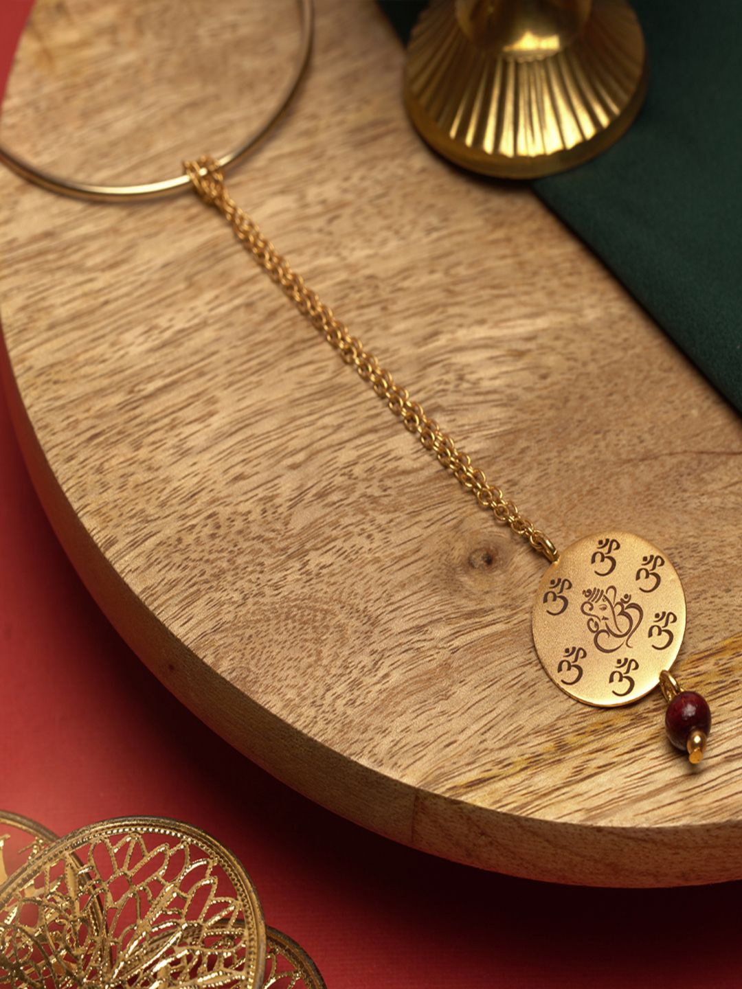 

Suhani Pittie 22kT Gold Plated Lumba Rakhi