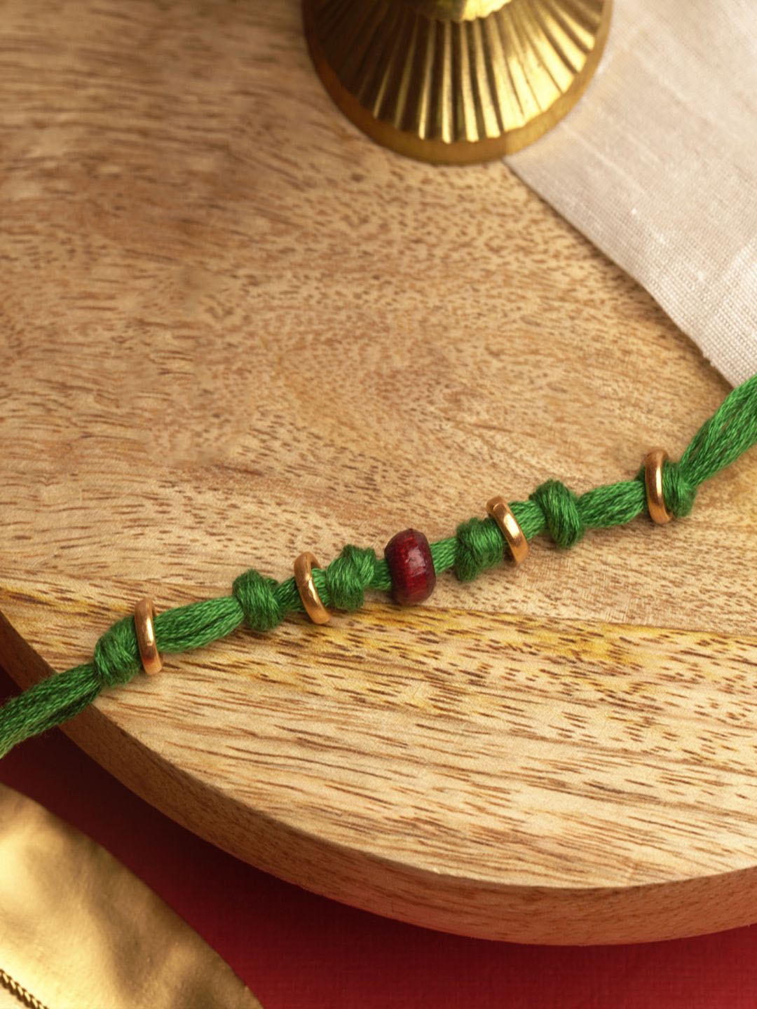 

Suhani Pittie Thread Rakhi, Green