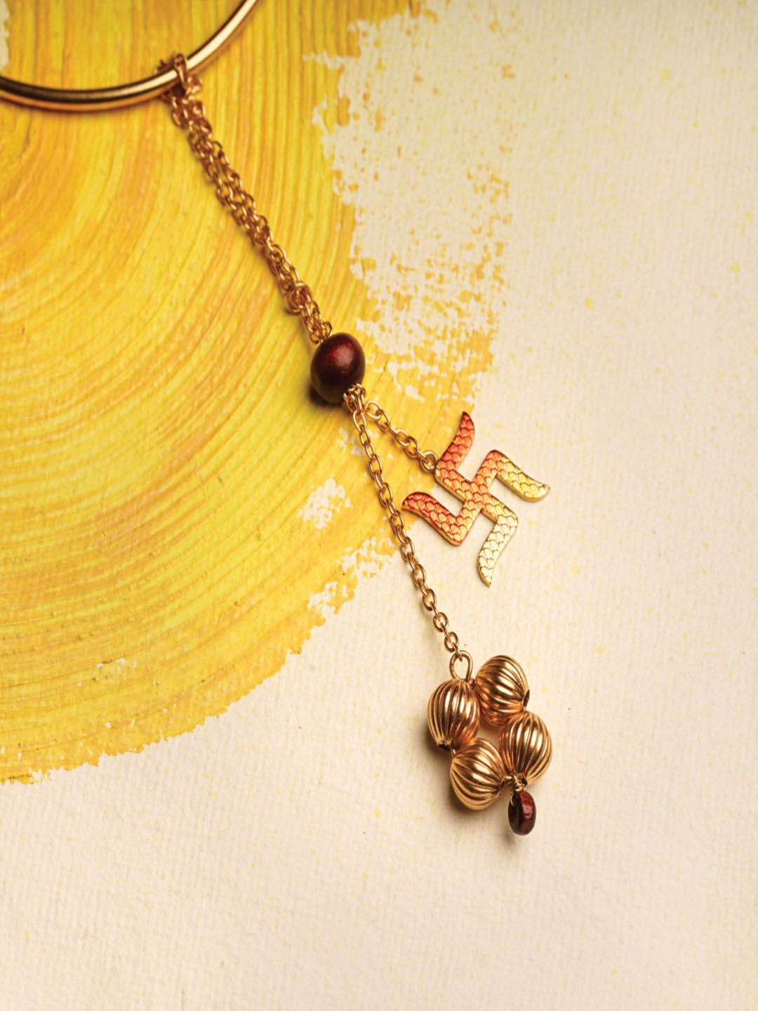 

Suhani Pittie Thread Rakhi, Gold