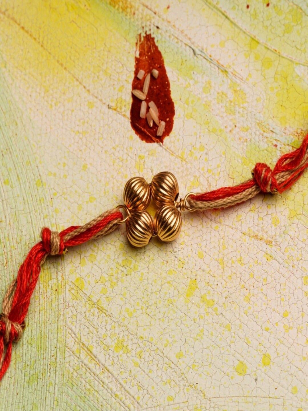 

Suhani Pittie Thread Rakhi, Gold