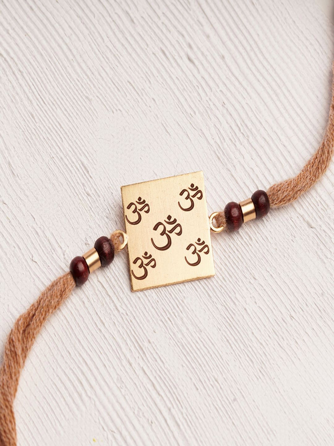 

Suhani Pittie Thread Rakhi, Beige