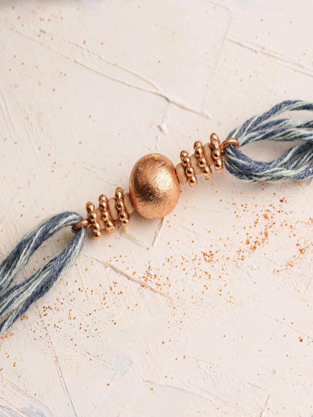 

Suhani Pittie Thread Rakhi, Gold