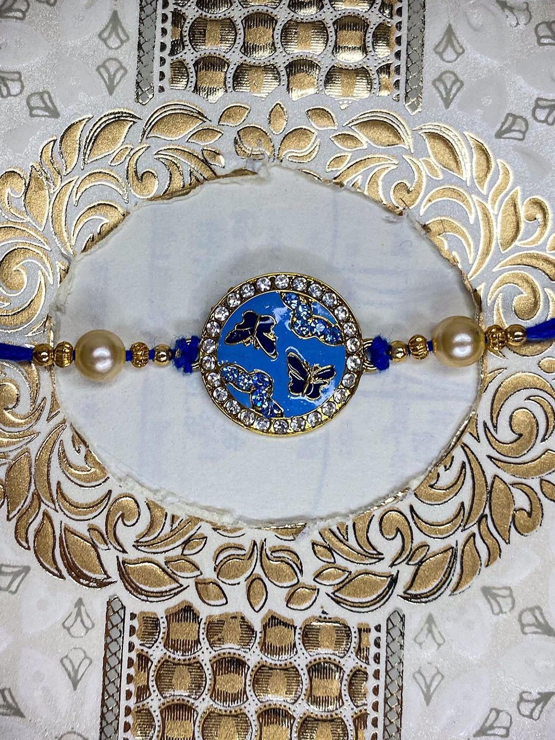 

Mahi Meenakari Work Enamel Round and Butterfly-Shaped Rakhi, Blue