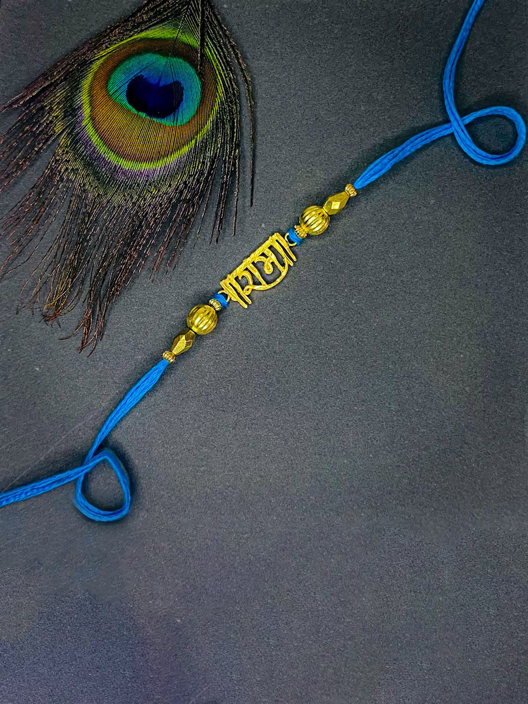 

Mahi Rama Thread Rakhi, Gold