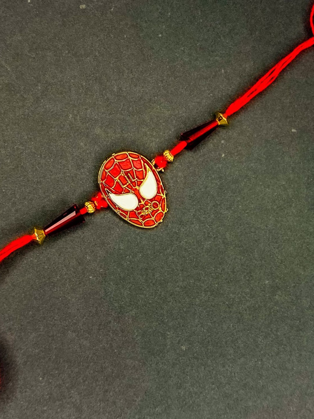 

Mahi Meenakari Work Super Hero Thread Rakhi, Red