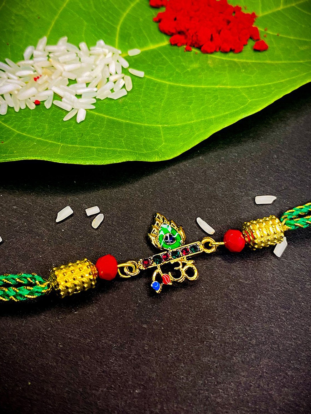 

Mahi Om Lord Krishna Flute and Meenakari Thread Rakhi With Roli Chawal, Gold