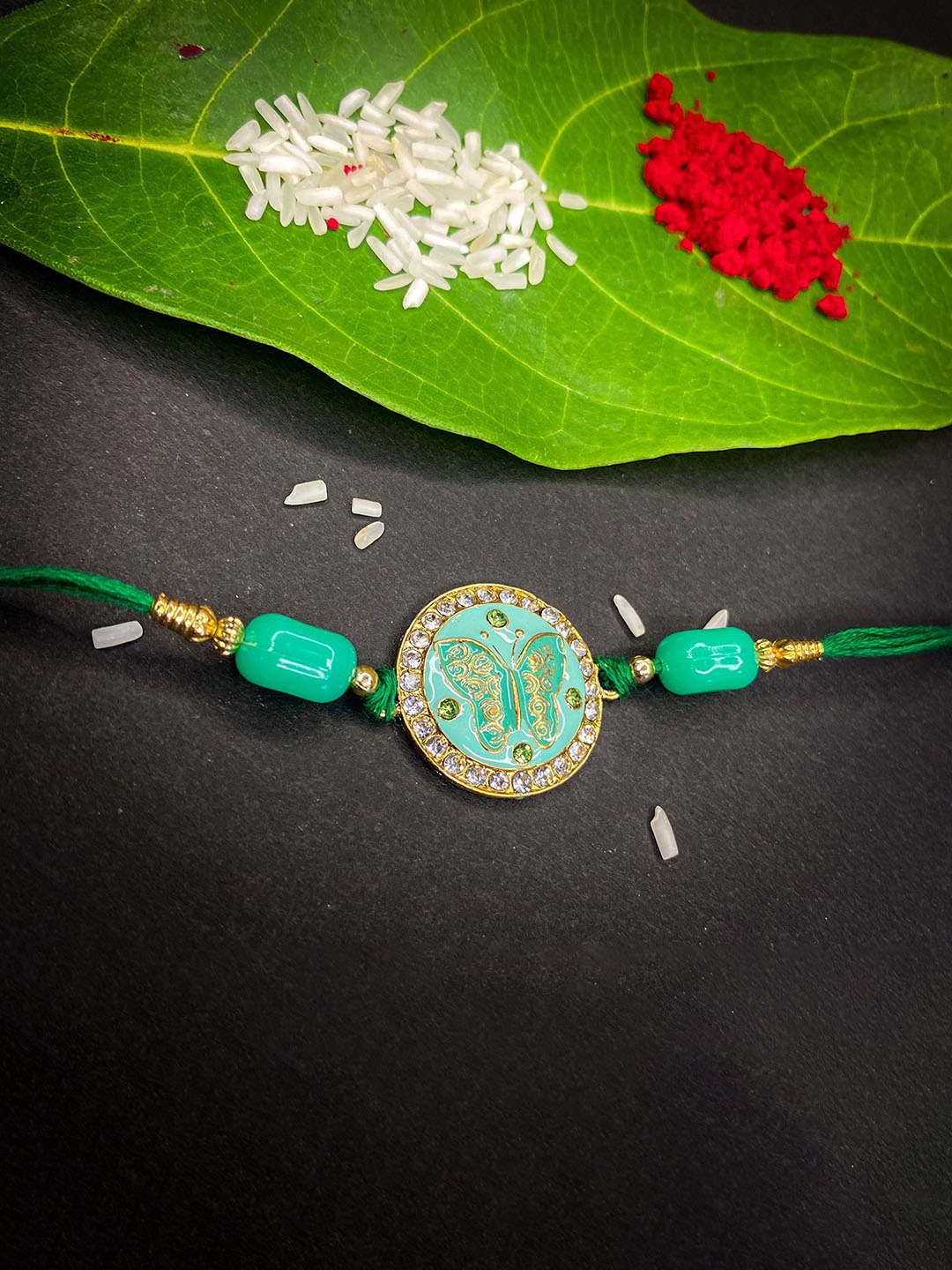 

Mahi Round & Butterfly-Shaped Thread Rakhi With Roli Chawal, Green