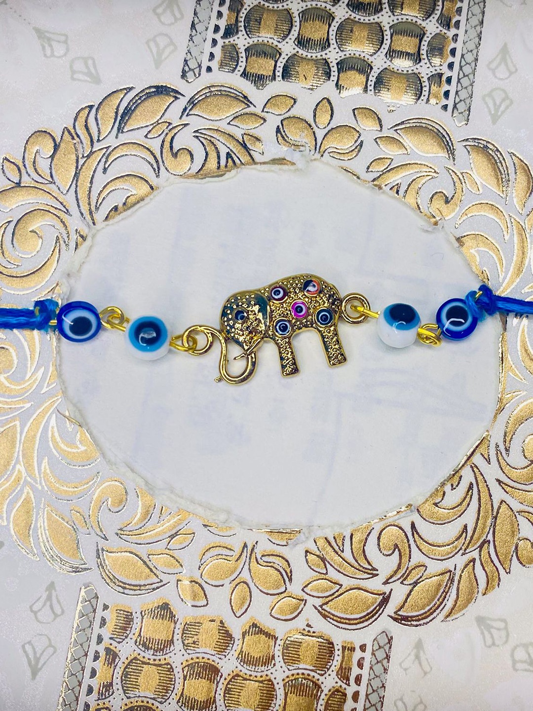 

Mahi Thread Rakhi, Gold