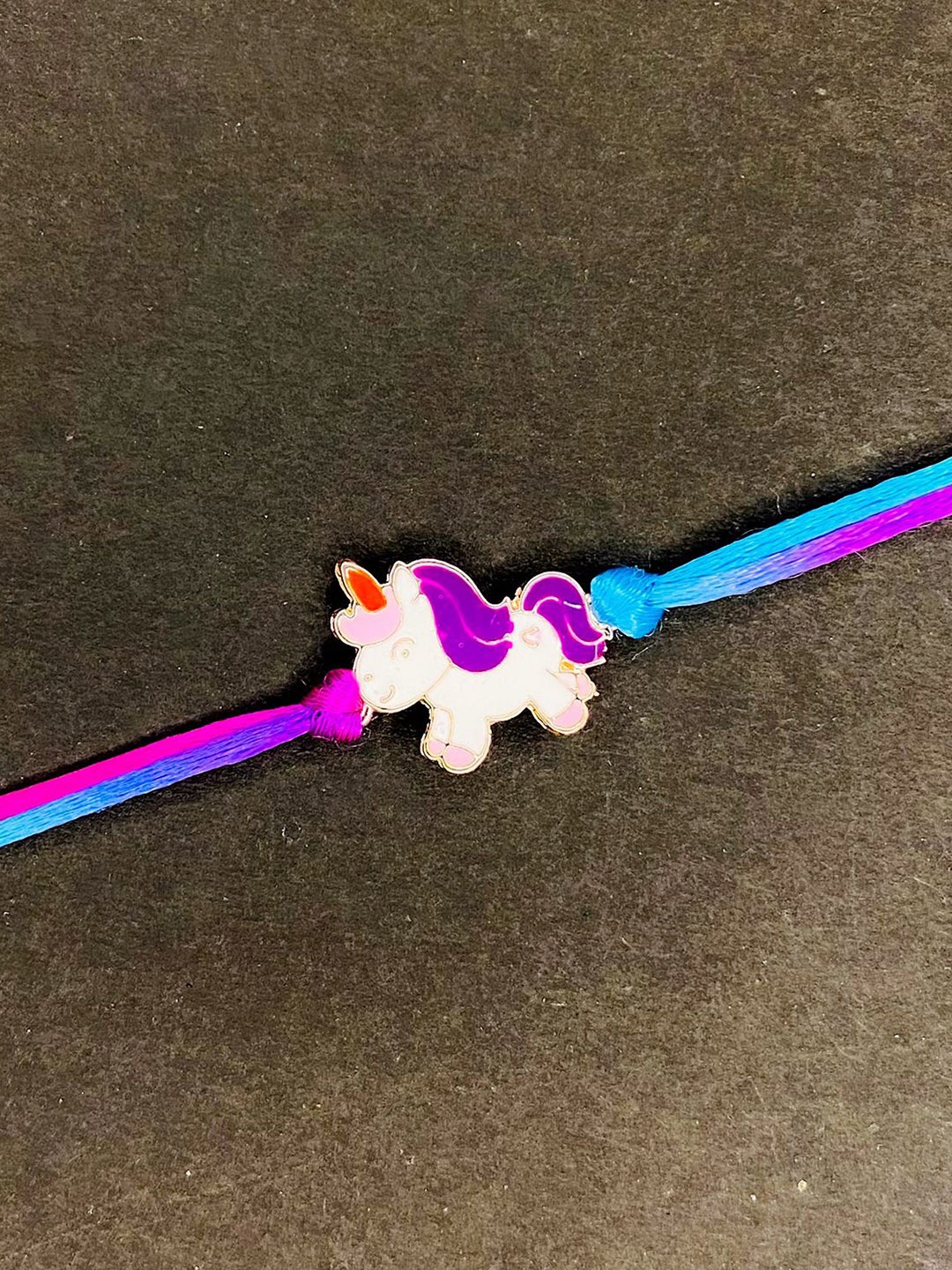 

Mahi Stone Unicorn-Shaped Rakhi Thread Rakhi, Yellow