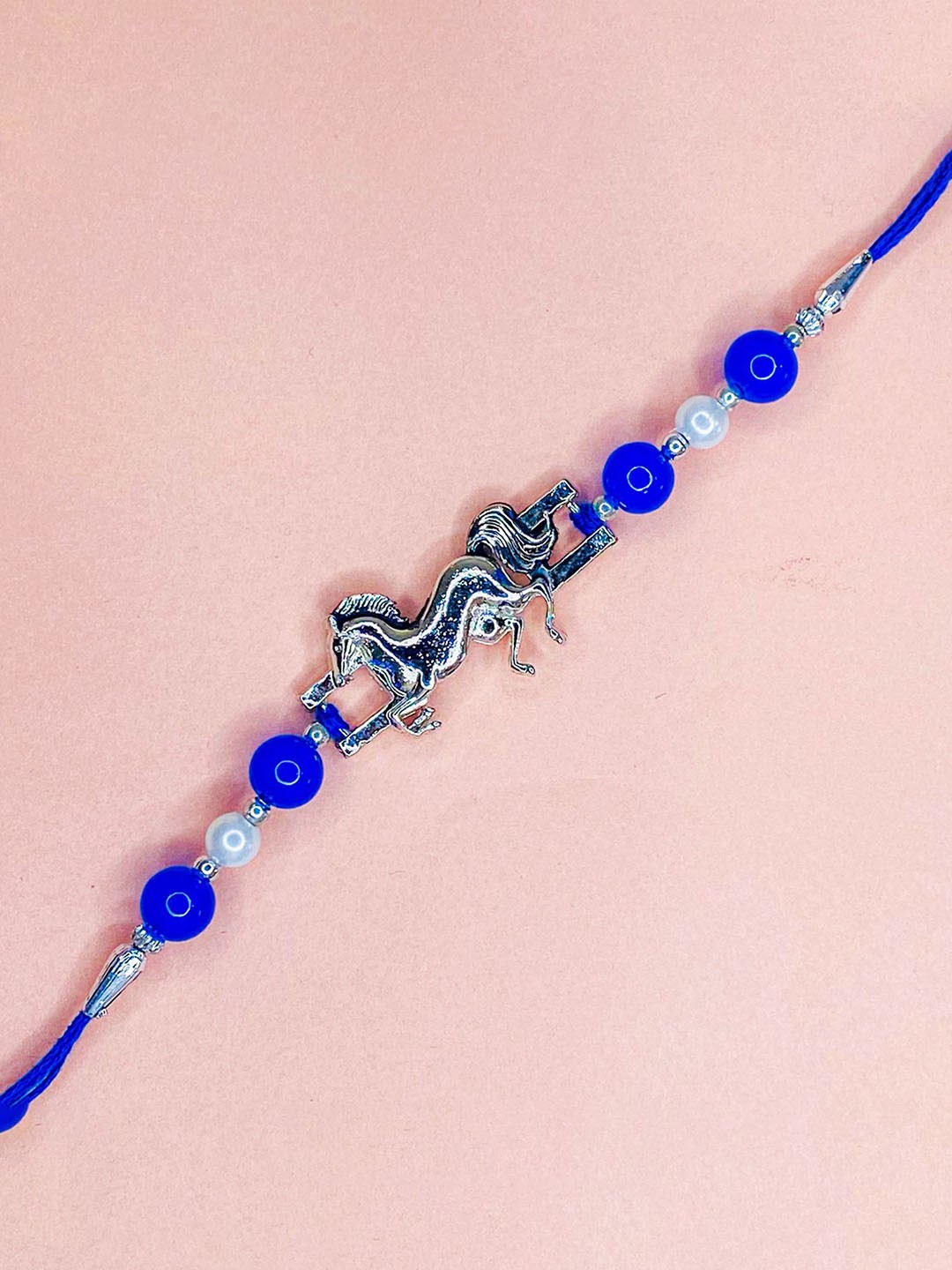 

Mahi Horse-Shaped Thread Rakhi, Blue