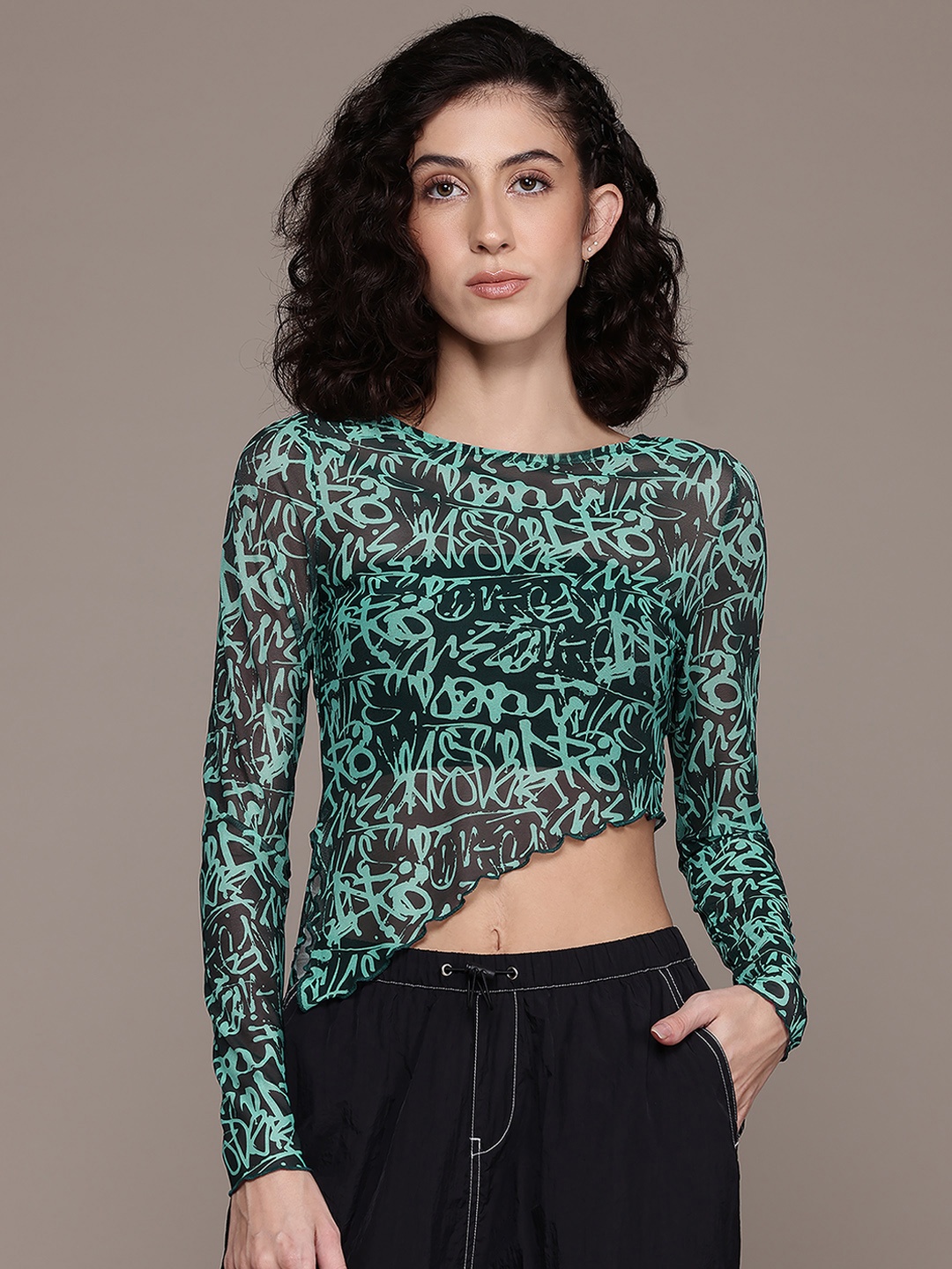 

The Roadster Lifestyle Co. Semi Sheer Asymmetric Hem Quirky Printed Top, Green