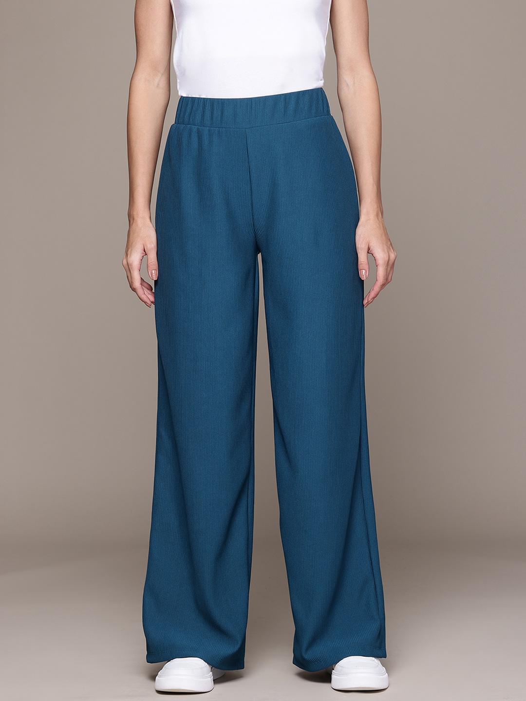 

Roadster Women Textured Loose Fit Trousers, Blue