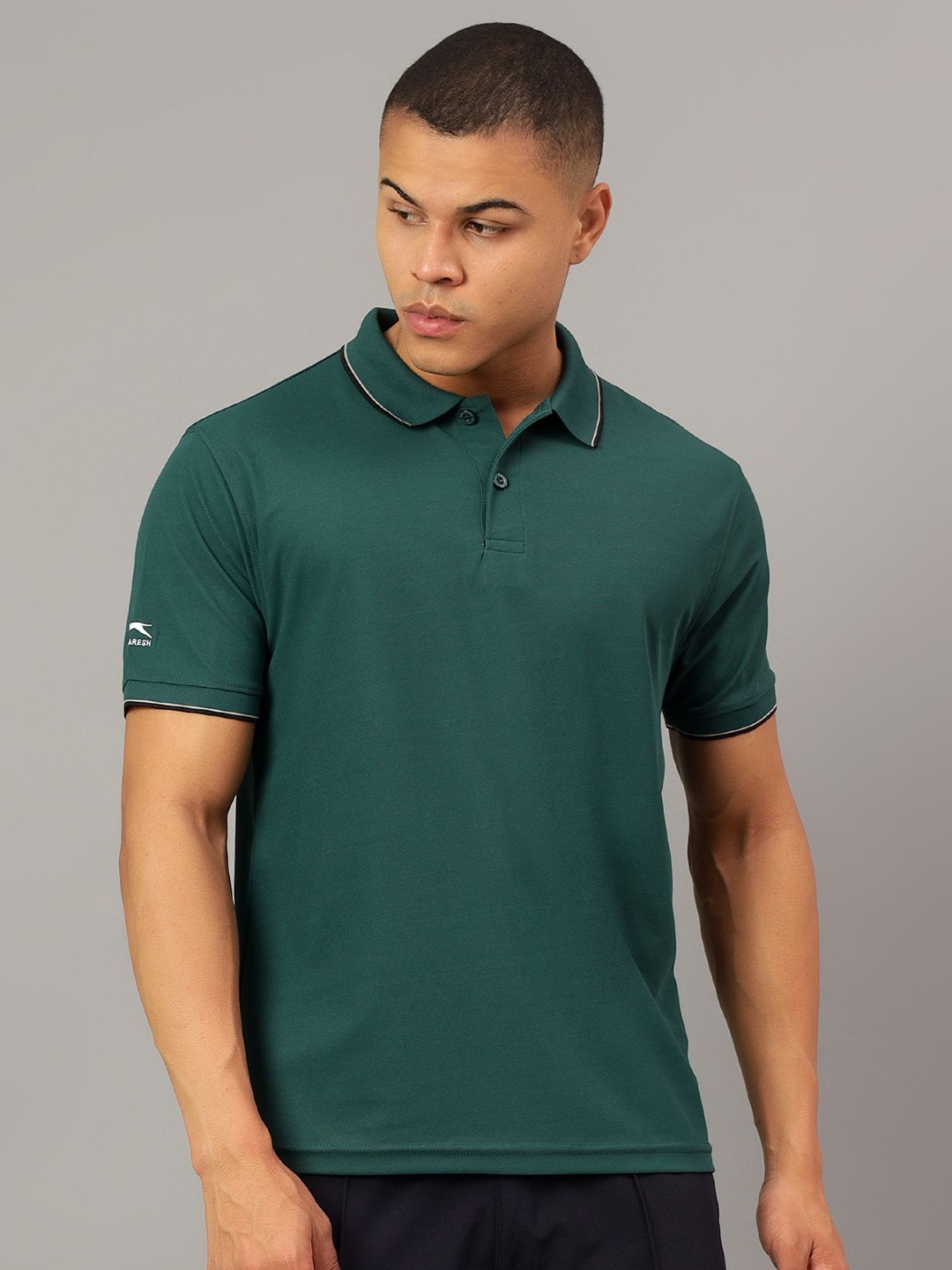 

Shiv Naresh Men Solid Polo Collar Polyester T-Shirt, Green