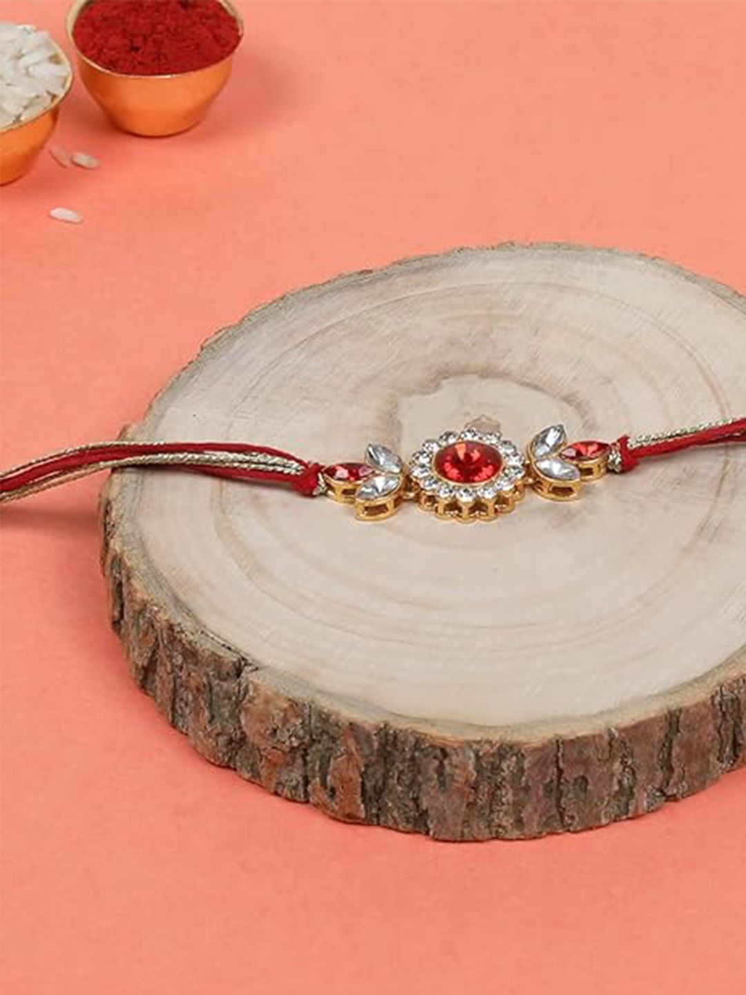 

Kaameri Bazaar Stone Studded & Beaded Thread Rakhi, Red