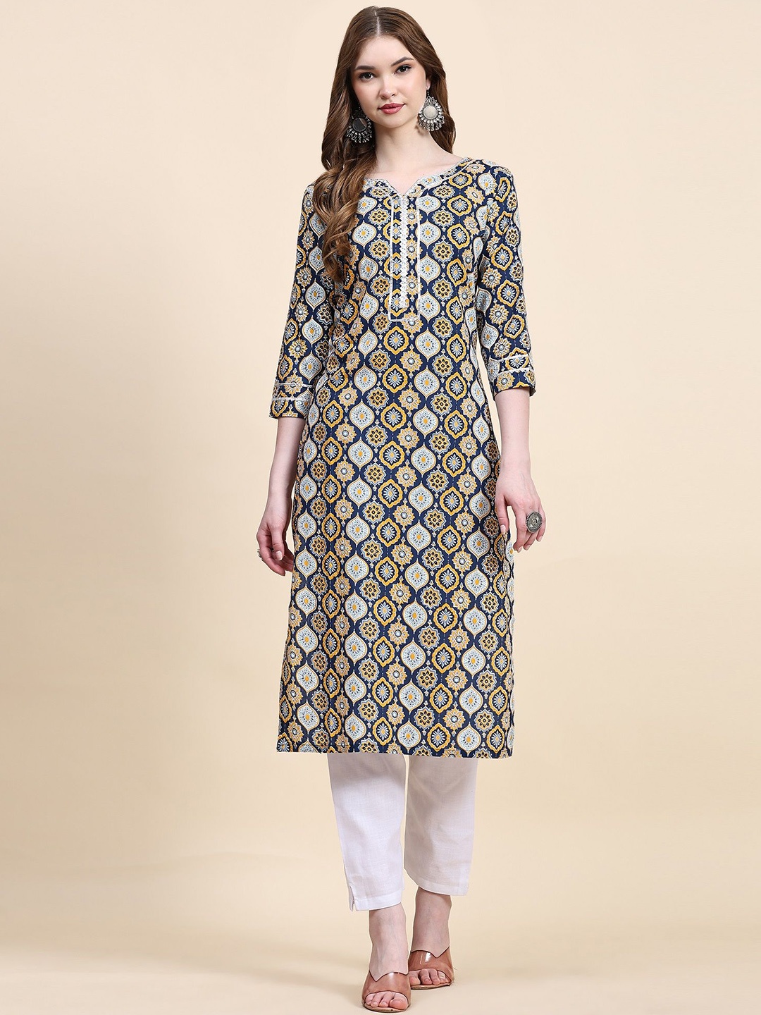 

QVAZOR Ethnic Motifs Printed Regular Kurta with Trousers, Yellow