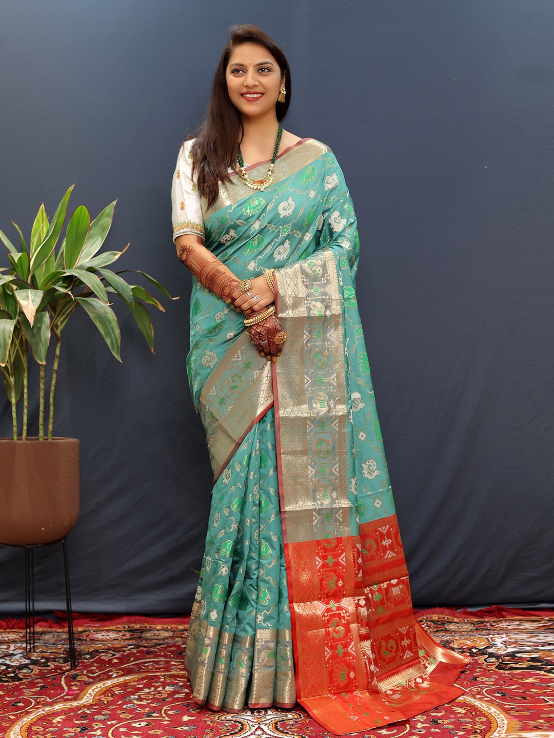 

Mitera Ethnic Motifs Zari Patola Saree, Sea green