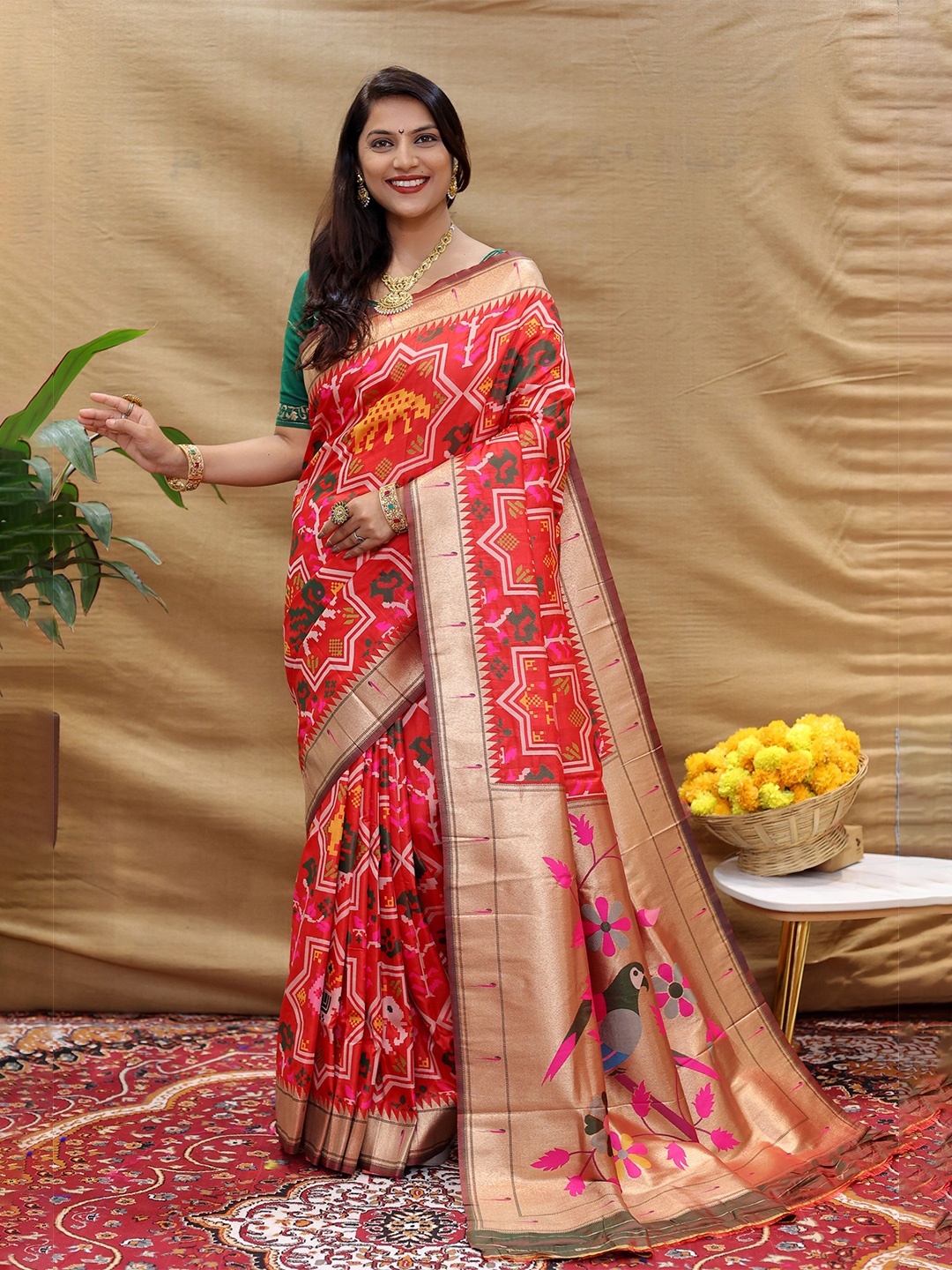 

Mitera Ethnic Motifs Woven Designed Zari Patola Saree, Red