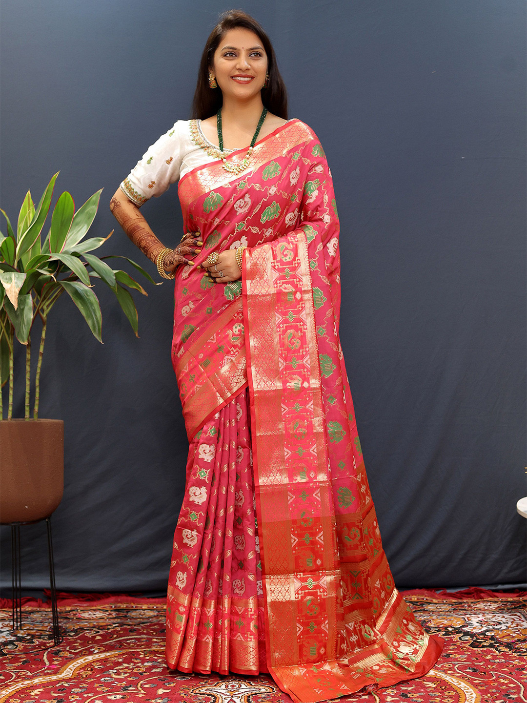 

Mitera Ethnic Motifs Woven Designed Zari Patola Saree, Red