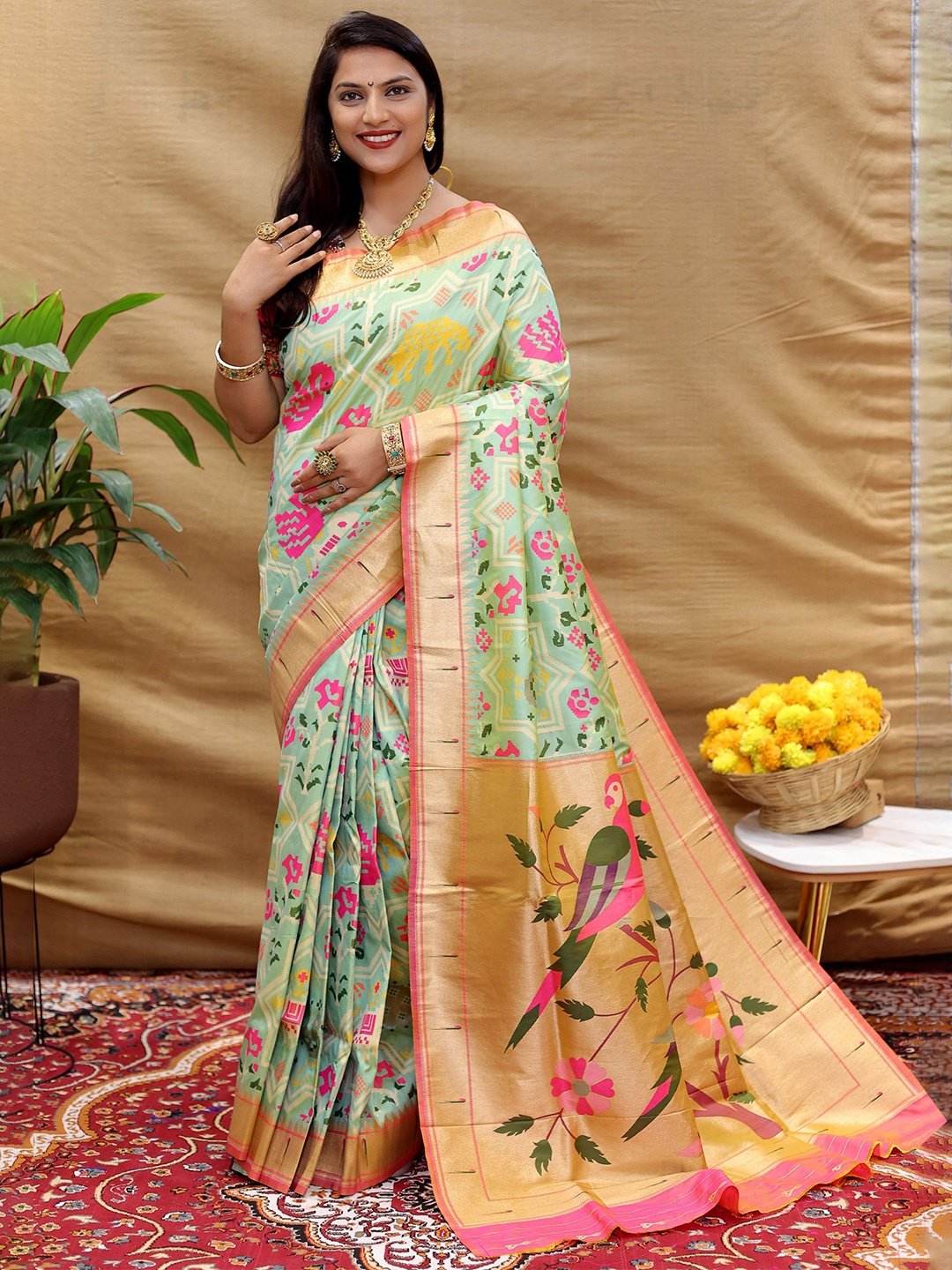 

Mitera Ethnic Motifs Woven Designed Zari Patola Saree, Green