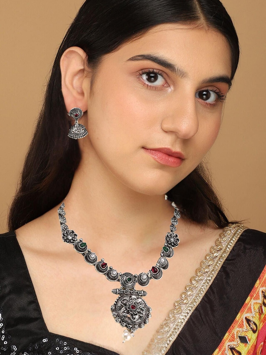 

MANSIYAORANGE Rhodium Plated Oxidised Stone Studded & Beaded German Silver Jewellery Set