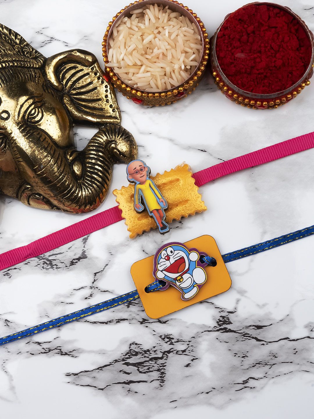 

StileAdda Kids Doraemon Thread Bhaiya Bhabhi Rakhis with Roli Chawal, Yellow