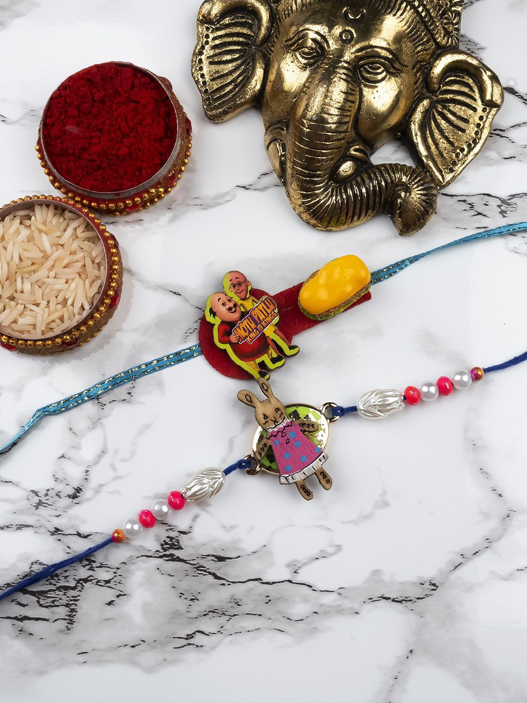 

StileAdda Kids Beaded Motu Patlu Thread Bhaiya Bhabhi Rakhis with Roli Chawal, Blue