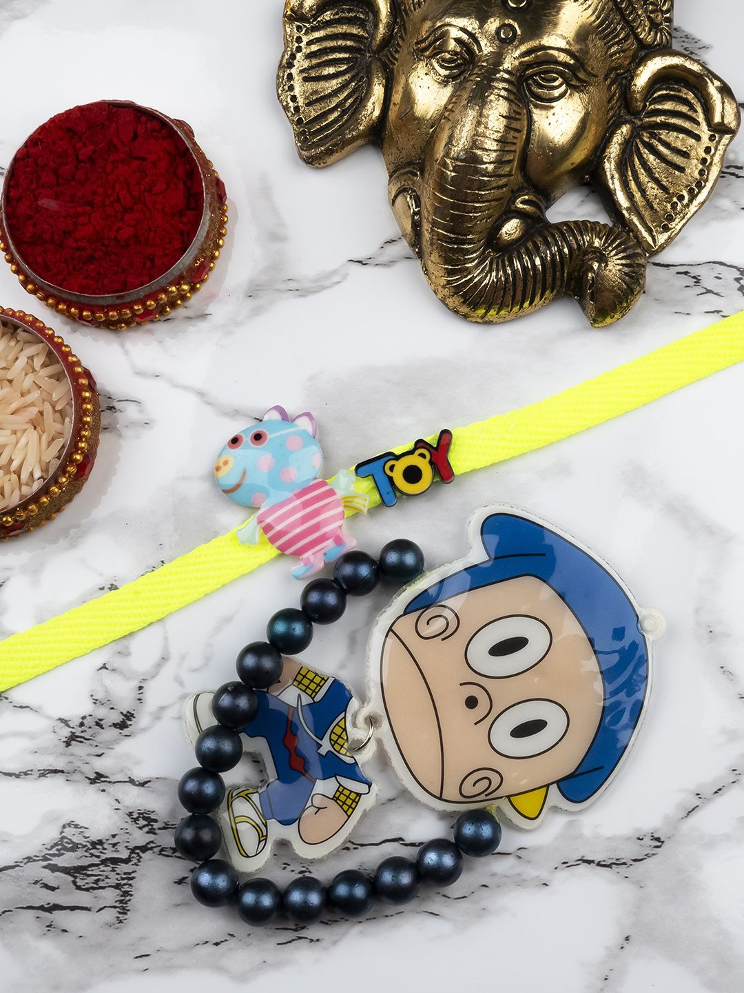 

StileAdda Kids Beaded Doraemon Thread Bhaiya Bhabhi Rakhis with Roli Chawal, Yellow