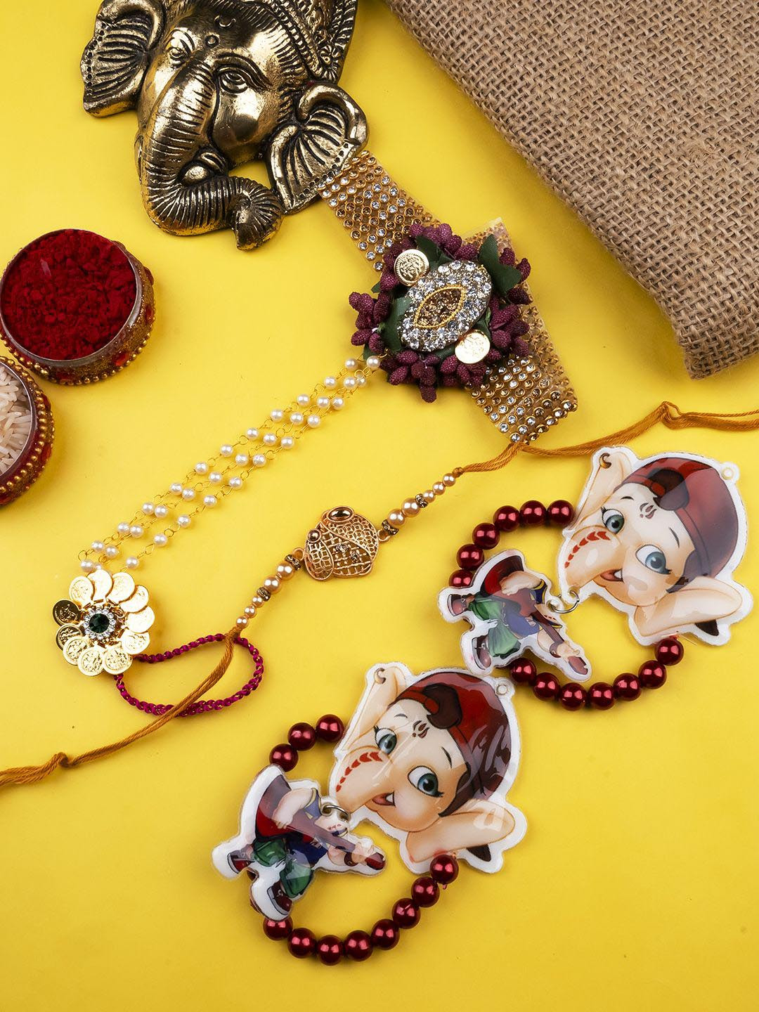 

StileAdda Set Of 4 Beaded Thread Rakhis With Roli & Chawal With Chandan And Mishri, Red
